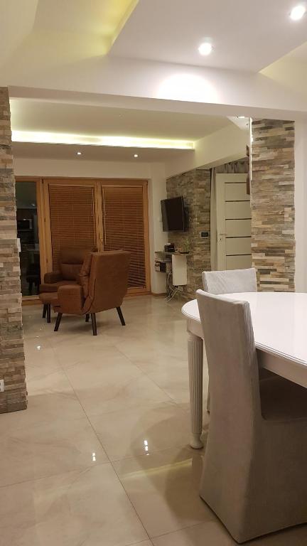 Posedenie v ubytovaní Apartamenty Toporowa Cyrhla