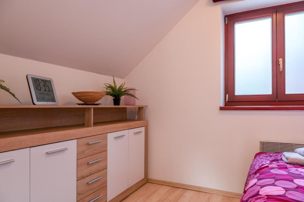 Postel nebo postele na pokoji v ubytování Hotel Zlechov