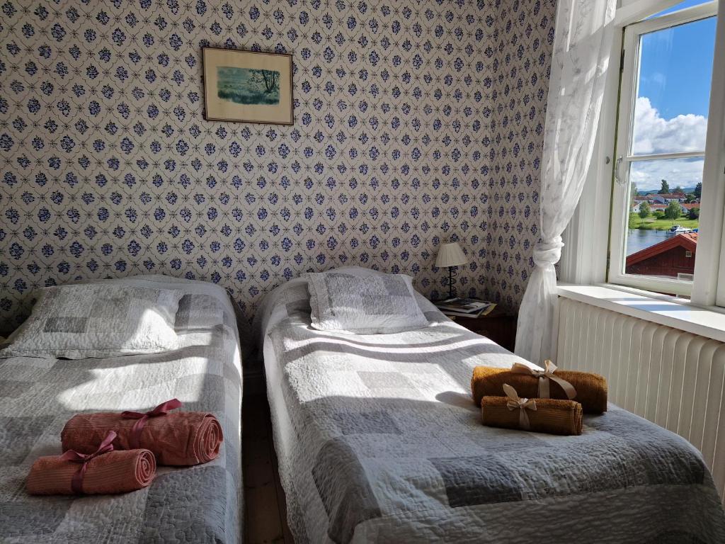 Postel nebo postele na pokoji v ubytování Wallinshuset