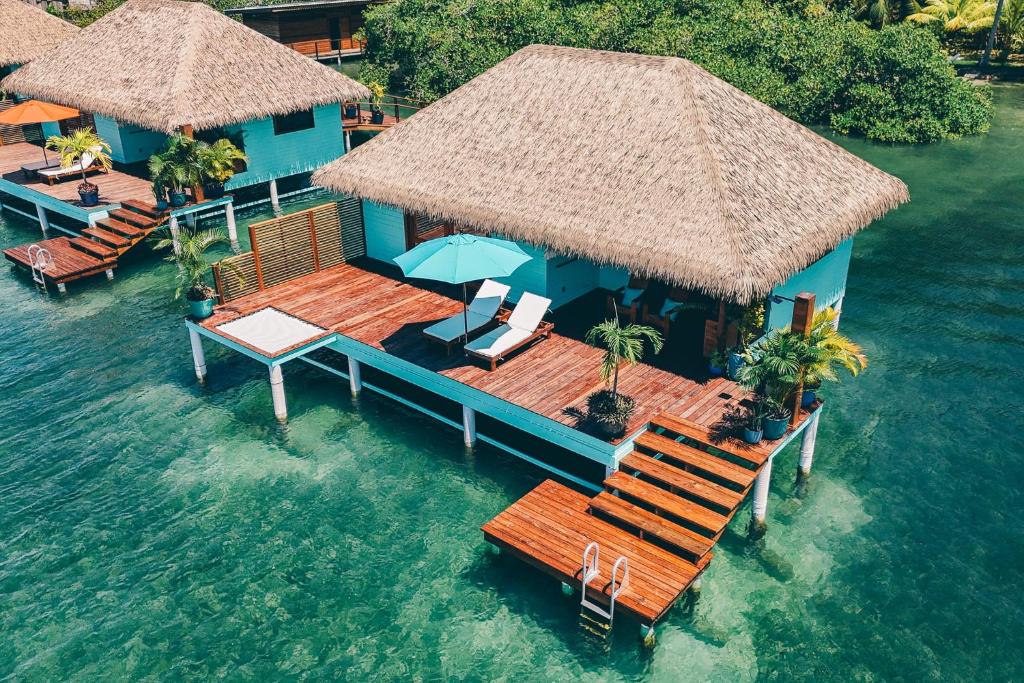 an aerial view of a house in the water at Sol Bungalows Bocas del Toro in Bocas del Toro