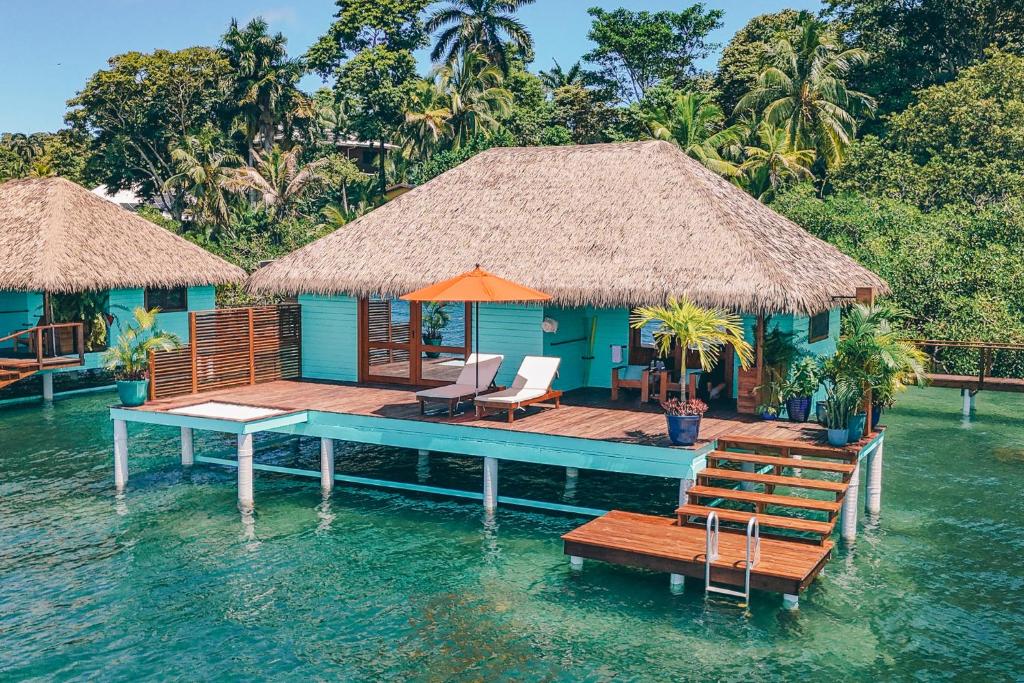 a house on a dock in the water at Sol Bungalows Bocas del Toro in Bocas del Toro