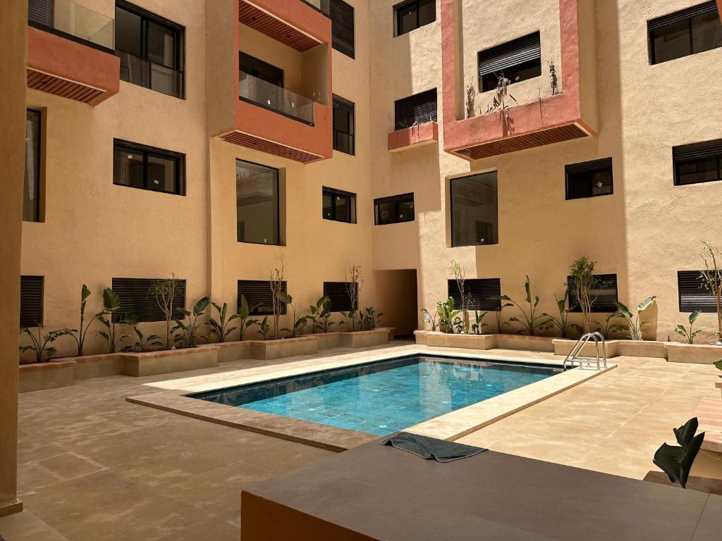 Bazén v ubytování Aube Hivernage appartement nebo v jeho okolí