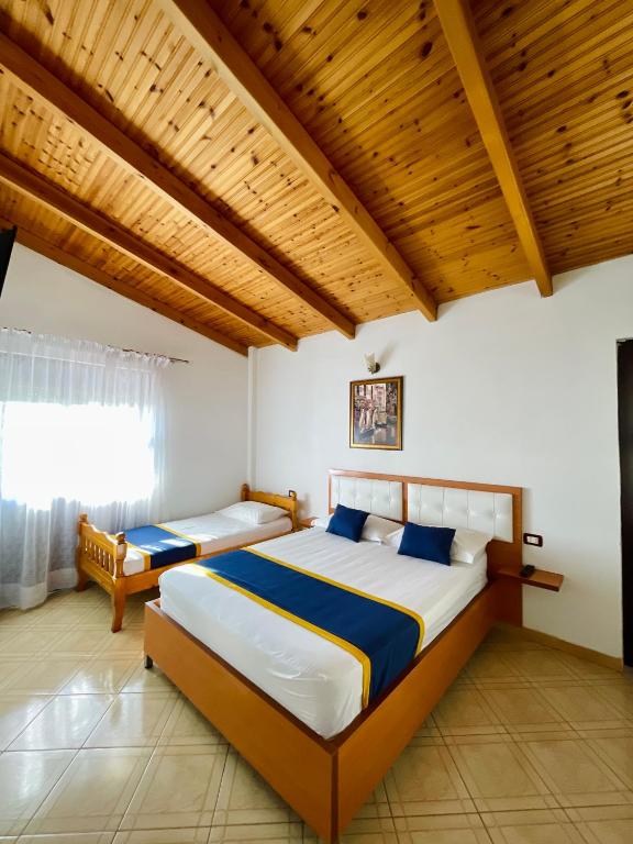 Una cama o camas en una habitación de Vila Toskaj
