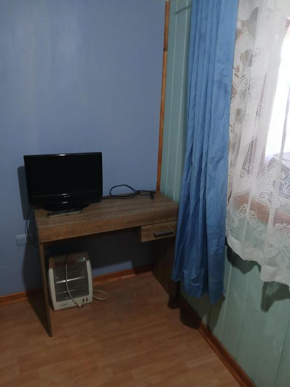 TV a/nebo společenská místnost v ubytování Casamath