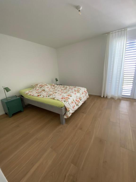 Postel nebo postele na pokoji v ubytování Upper Floor