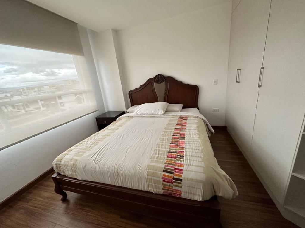 Postel nebo postele na pokoji v ubytování Instant Hotel - Departamentos de lujo en Ambato