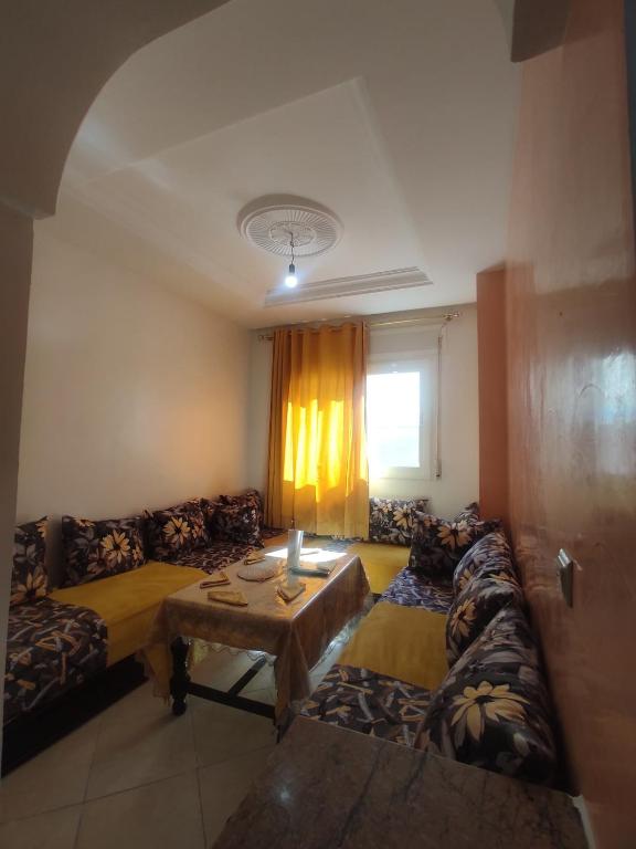 Posezení v ubytování Cozy 2-Room Apartment for Rent in Martil