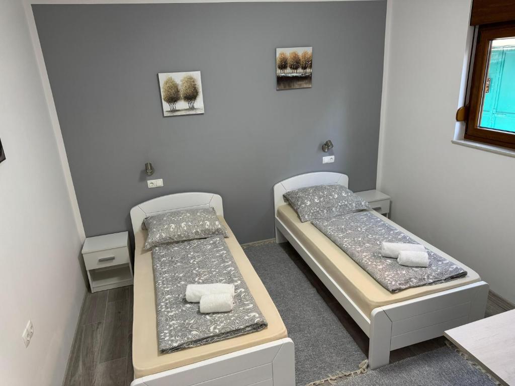 Postel nebo postele na pokoji v ubytování Guest House Stari