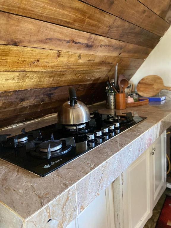 A kitchen or kitchenette at Dreamvilles Ecovillage Las Galeras
