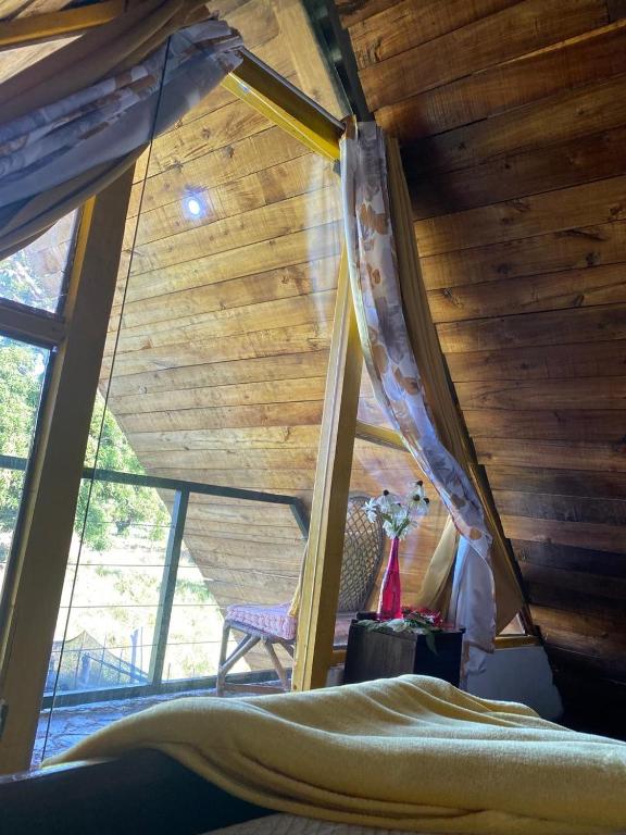 A bed or beds in a room at Dreamvilles Ecovillage Las Galeras