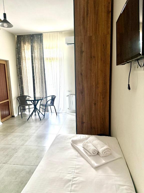 TV a/nebo společenská místnost v ubytování Hotel Barbare
