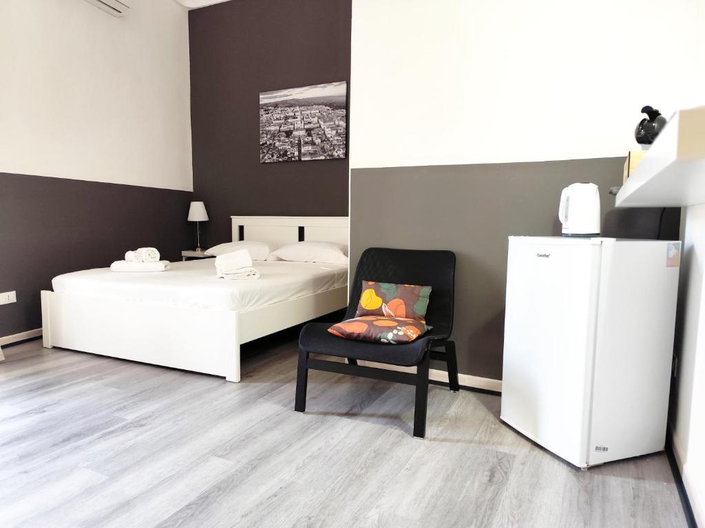 Postel nebo postele na pokoji v ubytování DUCEZIO rooms