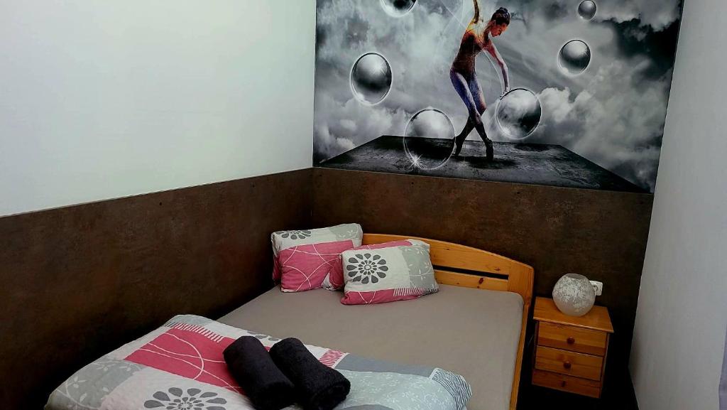 Postel nebo postele na pokoji v ubytování Penzion Malaika