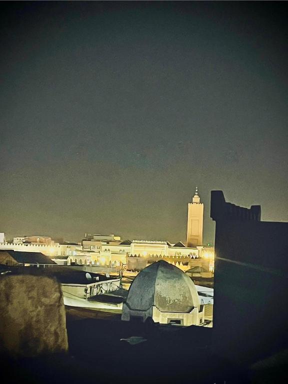 a view of a city with a domed building at Hotel afriquia in Oujda