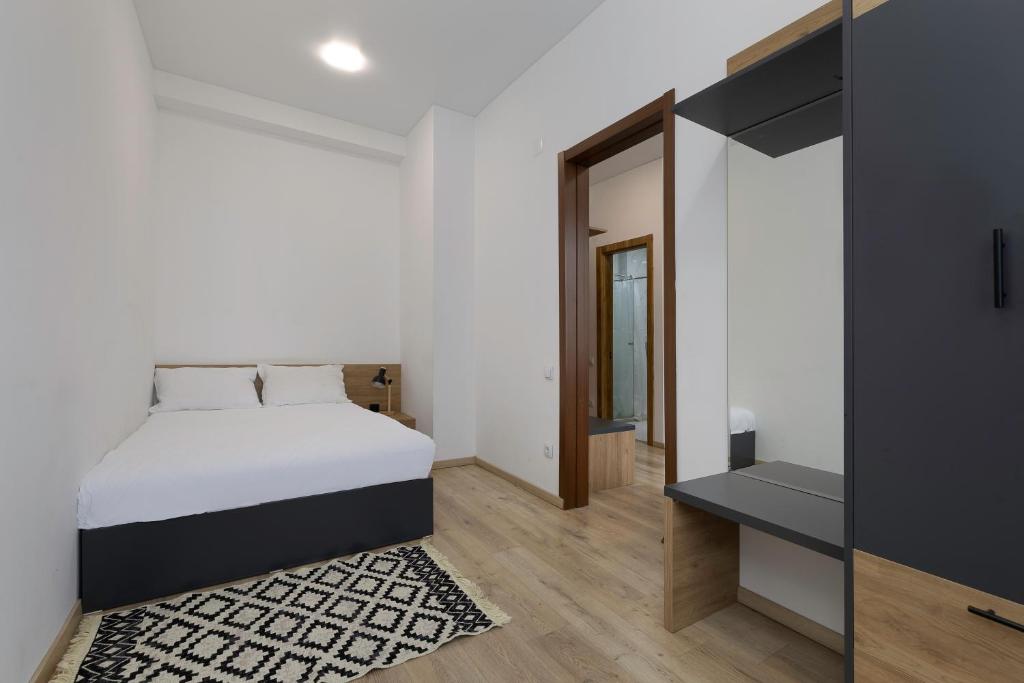 Postel nebo postele na pokoji v ubytování 3100 Boutique Hotel Kazbegi