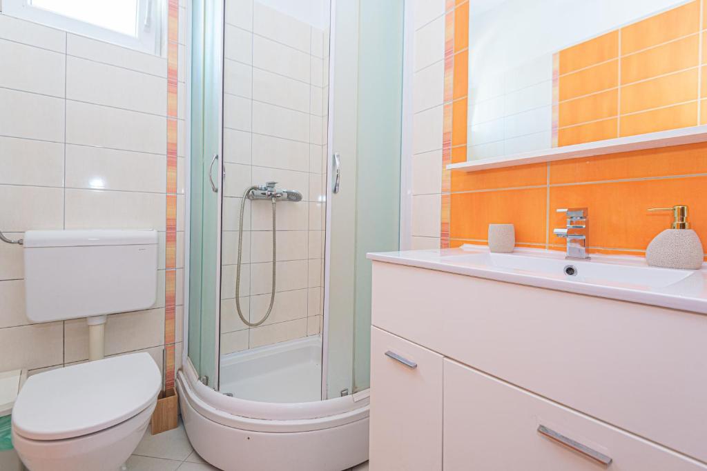 Kúpeľňa v ubytovaní Apartments Burazer