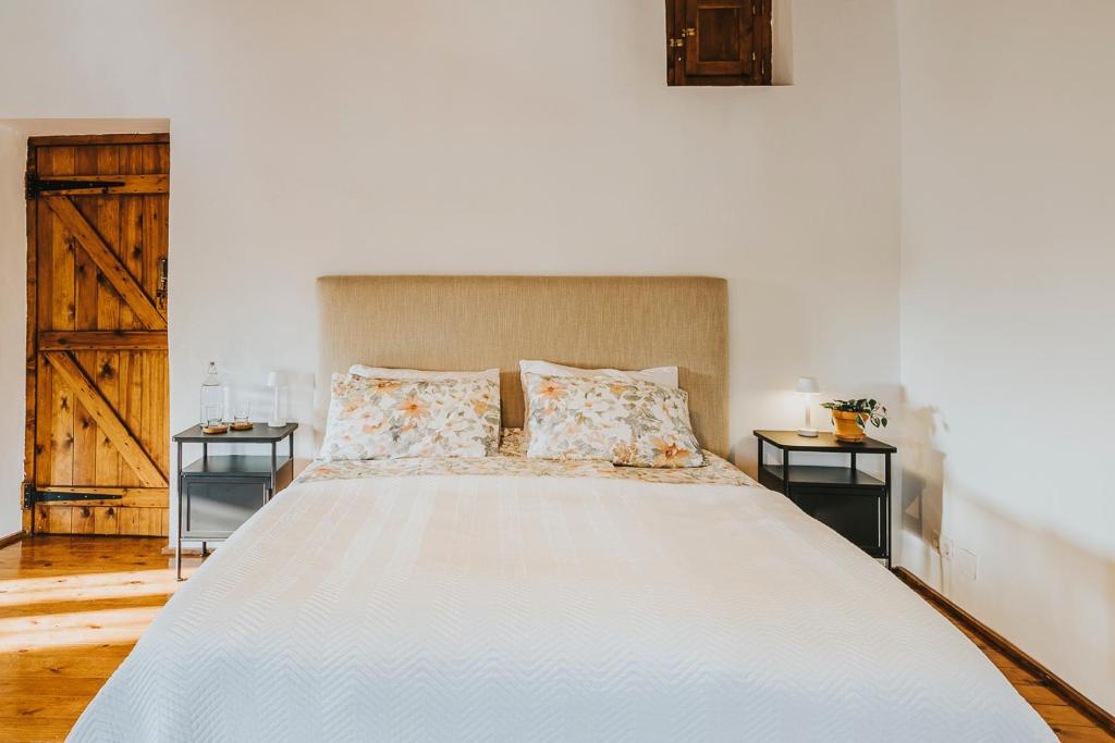 Postel nebo postele na pokoji v ubytování Hotel Casa Pedro Barrera