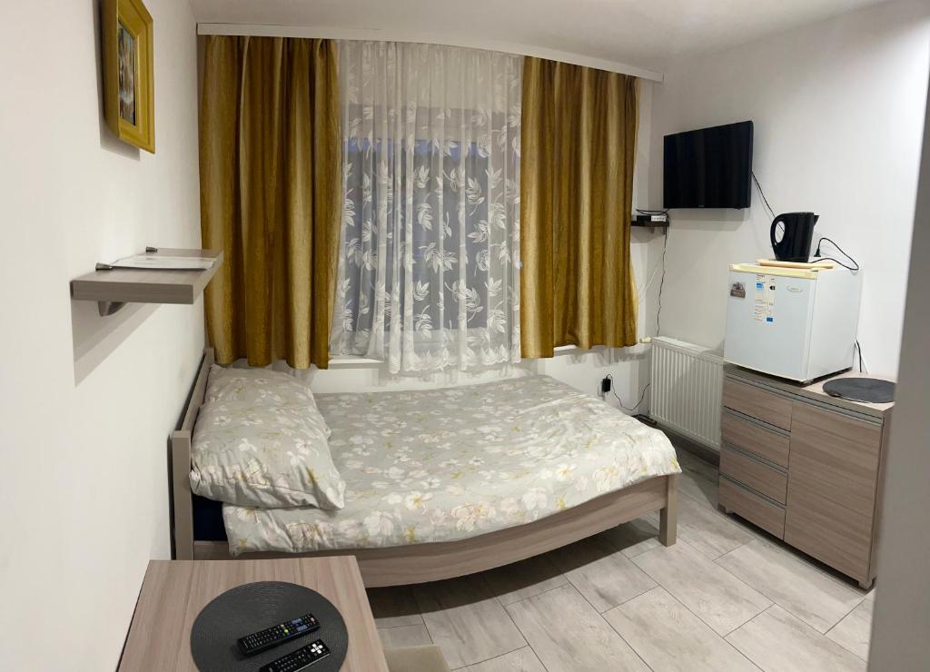 Postel nebo postele na pokoji v ubytování Magnolia