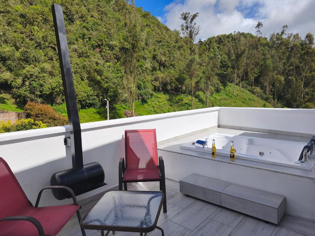Balkón nebo terasa v ubytování Mirador samsara Penthouse con Jacuzzi al aire libre,piso completo