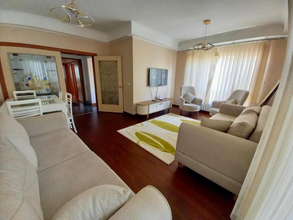 Μια τηλεόραση ή/και κέντρο ψυχαγωγίας στο Çetin Emeç Clty Center 3 Bedroom