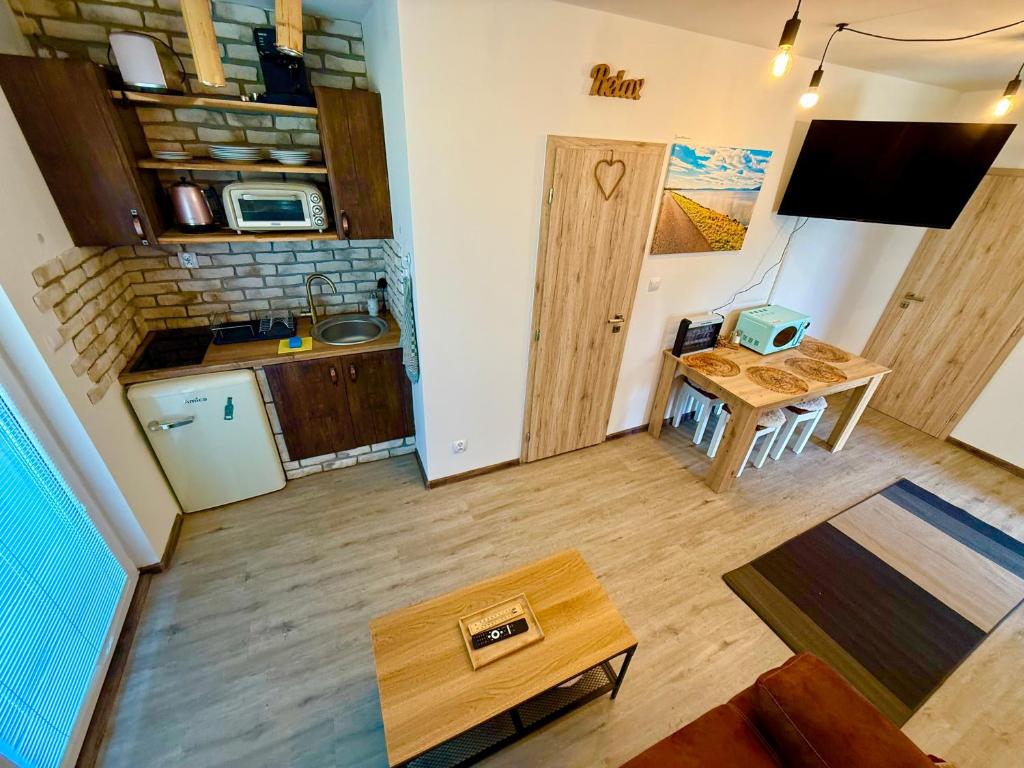 Kuchyň nebo kuchyňský kout v ubytování Apartmány Apollo