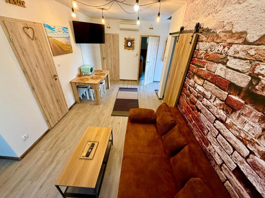 TV a/nebo společenská místnost v ubytování Apartmány Apollo