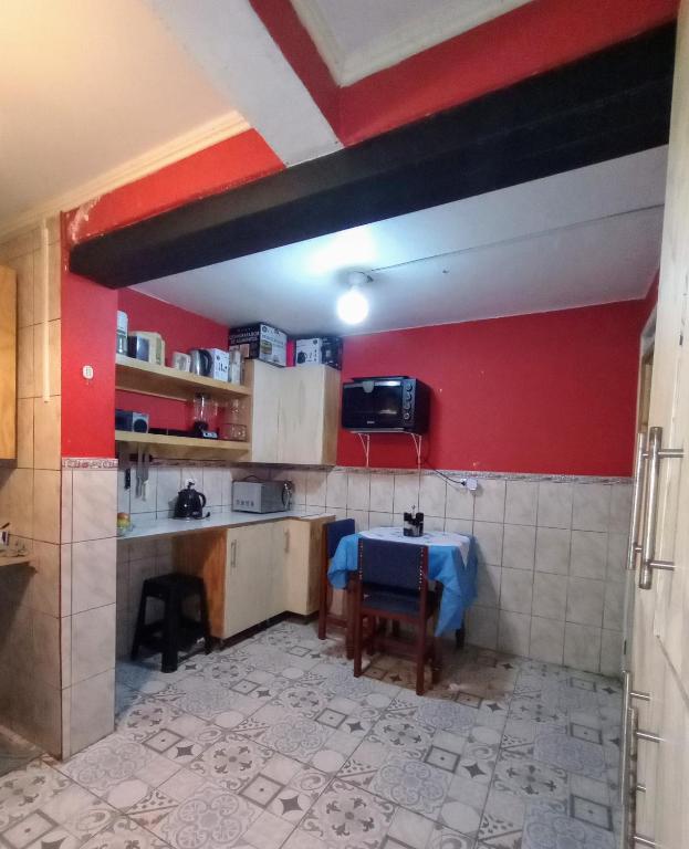 Kuchyň nebo kuchyňský kout v ubytování Good Vibes Guest House