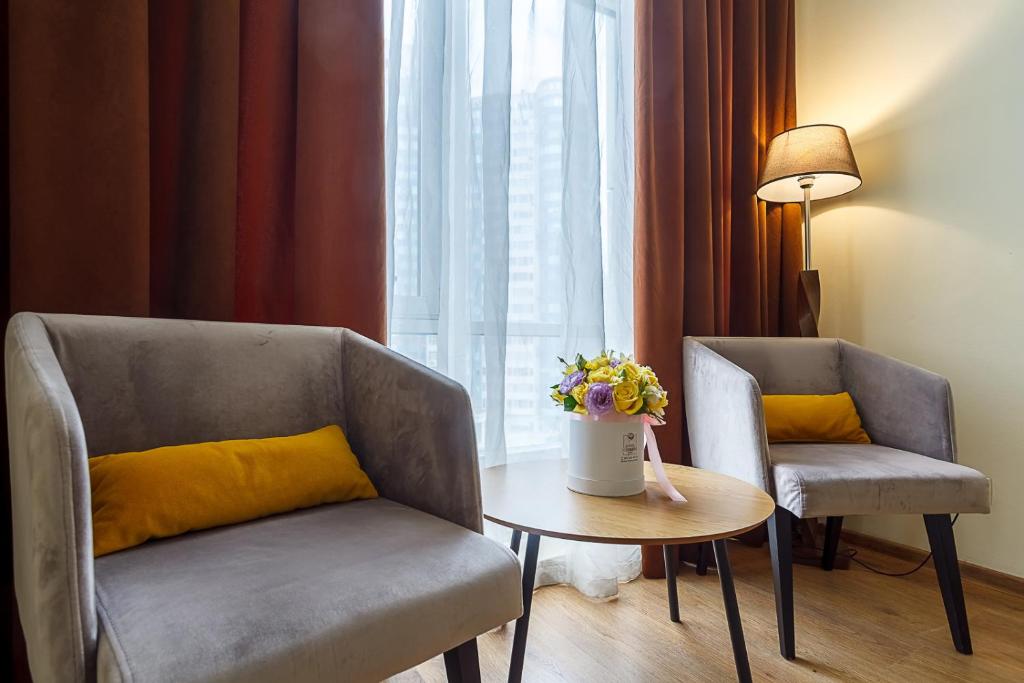 Posezení v ubytování Corona Hotel & Apartments
