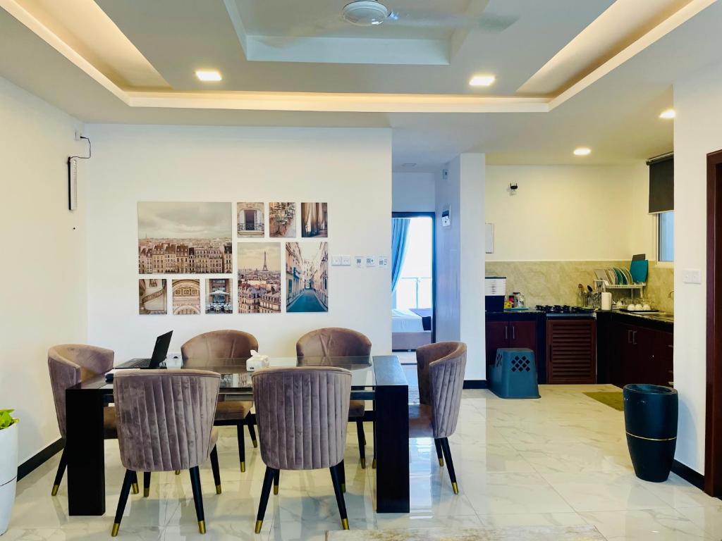 Kuchyň nebo kuchyňský kout v ubytování Green Star City Apartment
