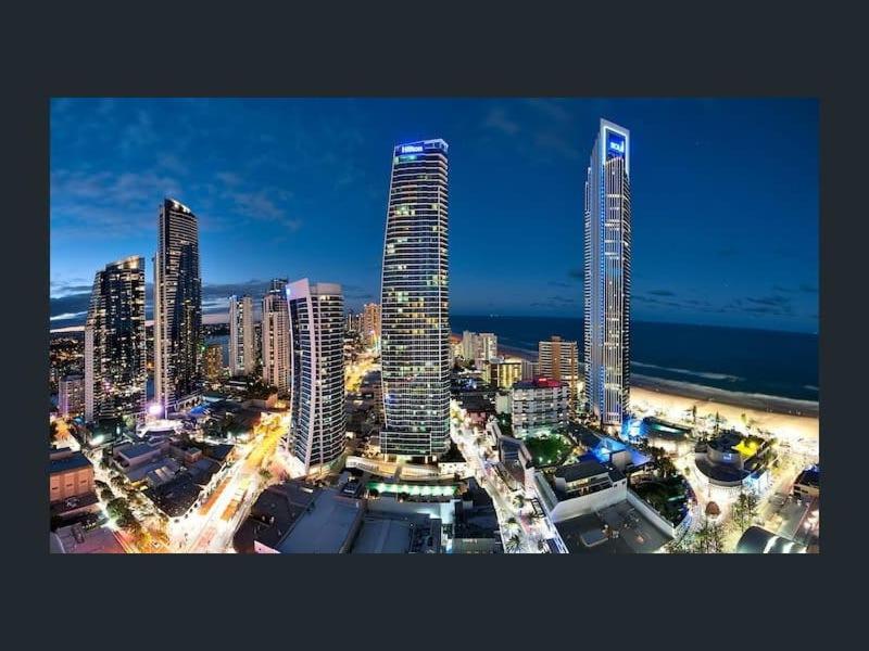 a city skyline with tall buildings and the ocean at 5 star 3 Bedroom Apt on Surfers Paradise Beach, Ocean views from every room in Gold Coast