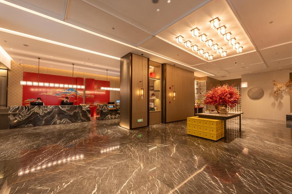 Ο χώρος του λόμπι ή της ρεσεψιόν στο Yicheng Hotel, Jianghan Road Pedestrian Street, Wuhan River Beach