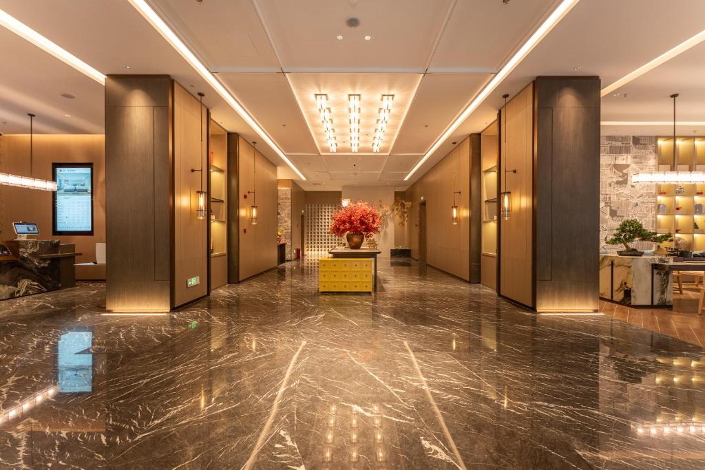Φωτογραφία από το άλμπουμ του Yicheng Hotel, Jianghan Road Pedestrian Street, Wuhan River Beach στο Γουχάν