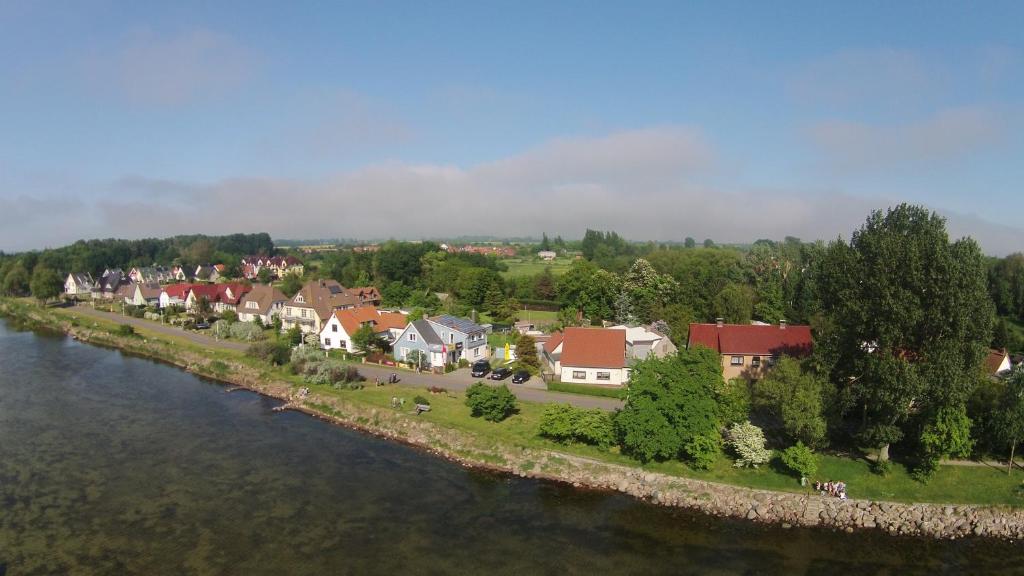 an aerial view of a town next to a river at Haus am Meer in Wiek auf Rügen