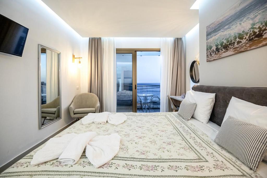 Katil atau katil-katil dalam bilik di Creta Mare Hotel