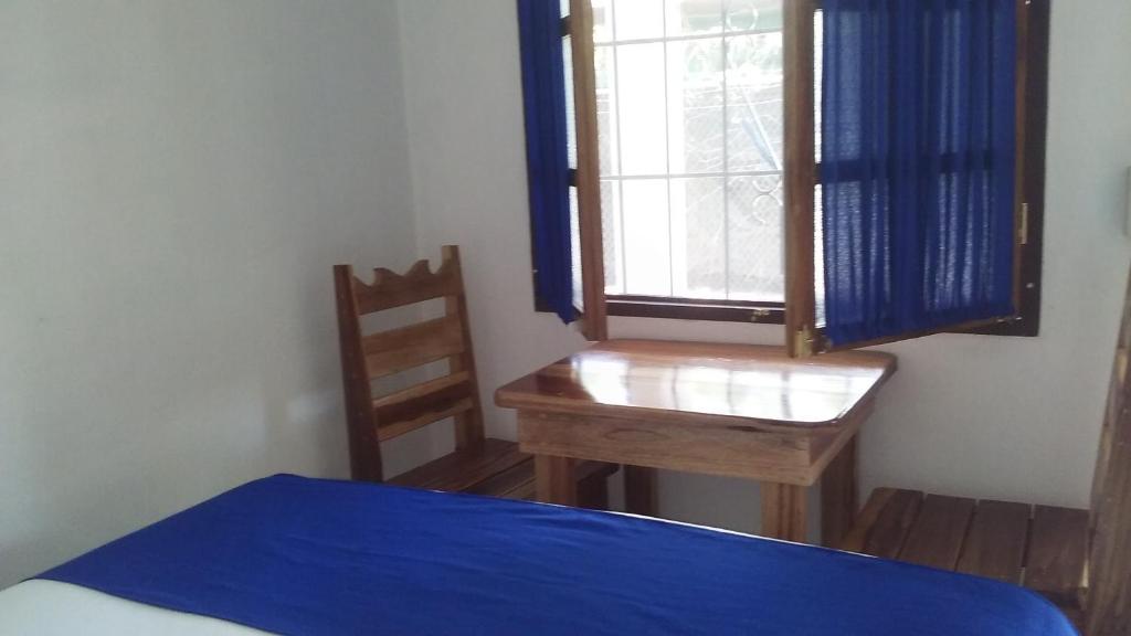 Postel nebo postele na pokoji v ubytování Cabinas Smith 2