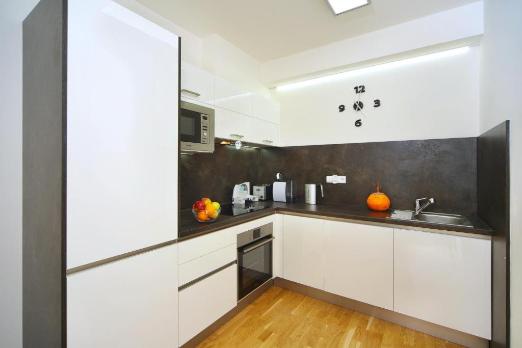 Kuchyň nebo kuchyňský kout v ubytování Apartment Medvědín 331/110