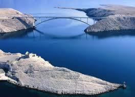a bridge over a large body of water at Apartment Ruby in Mandre