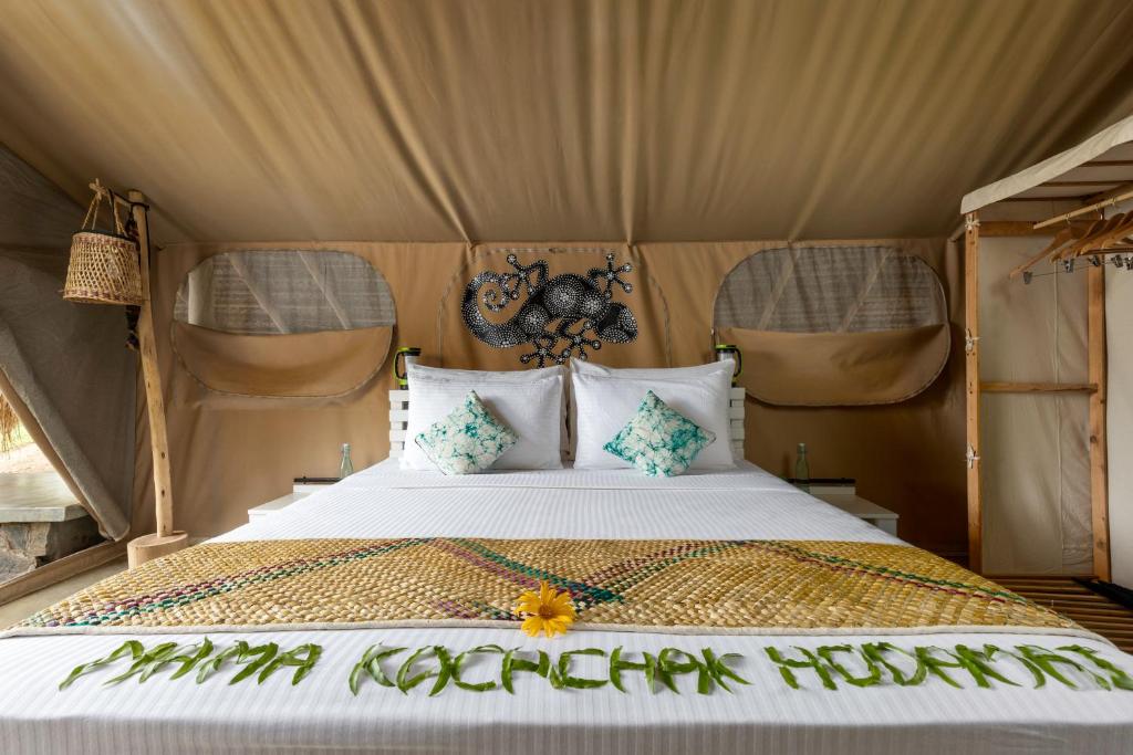 Postel nebo postele na pokoji v ubytování Wild Glamping Gal Oya - Thema Collection