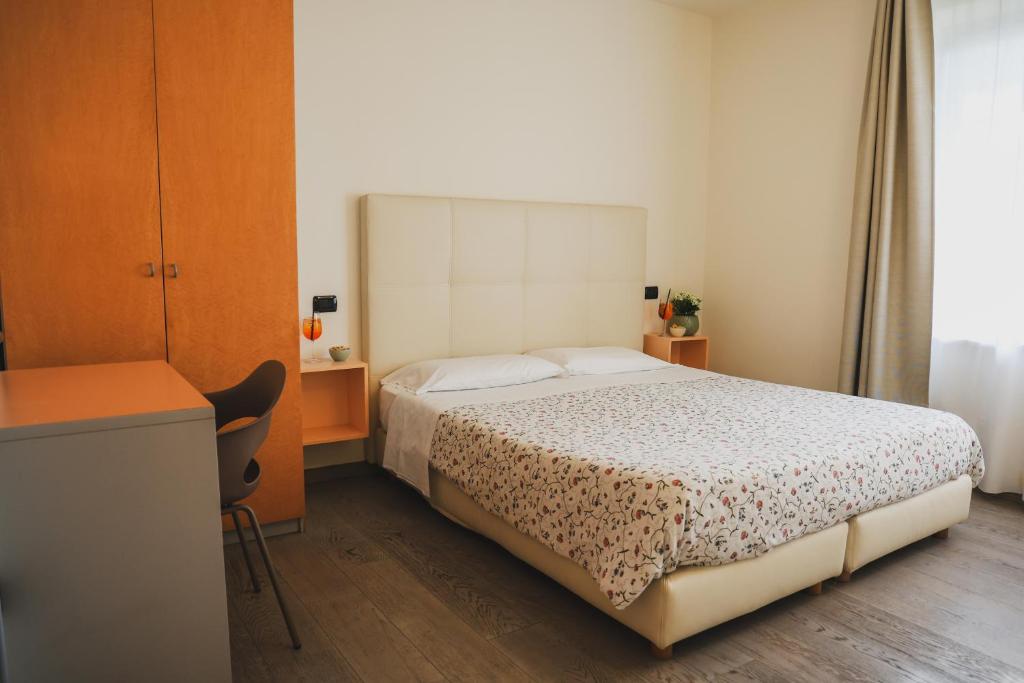 Postel nebo postele na pokoji v ubytování Hotel Eden