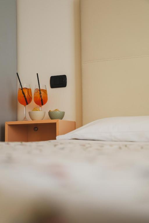 Postel nebo postele na pokoji v ubytování Hotel Eden