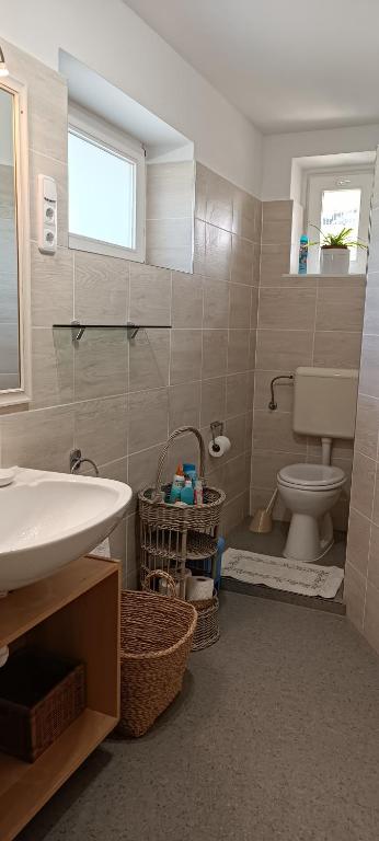 Koupelna v ubytování Marianna Apartman