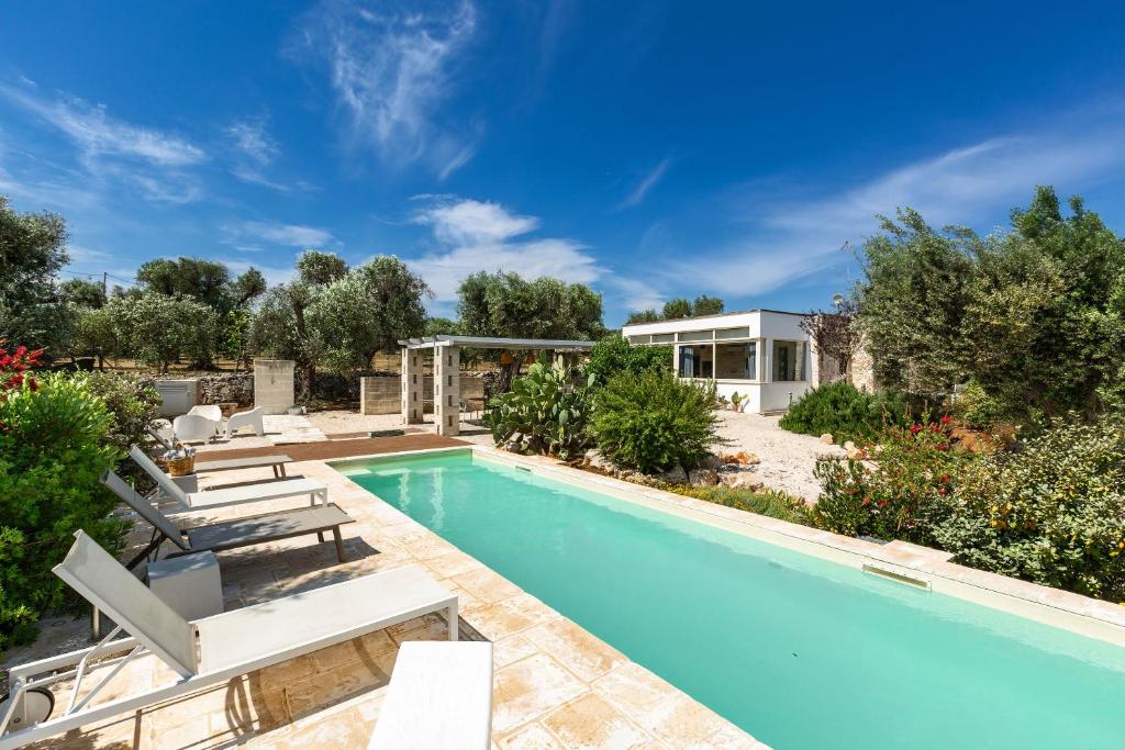 an image of a swimming pool in a villa at Biancaluna Luxury Retreat by Perle di Puglia in Ostuni