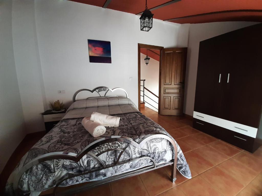 Postel nebo postele na pokoji v ubytování Casa Rural El Solarillo