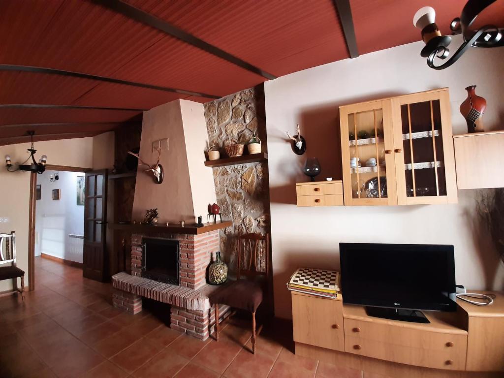 TV a/nebo společenská místnost v ubytování Casa Rural El Solarillo