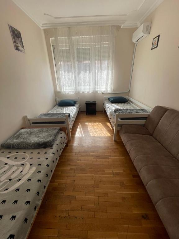 Postel nebo postele na pokoji v ubytování Moon House