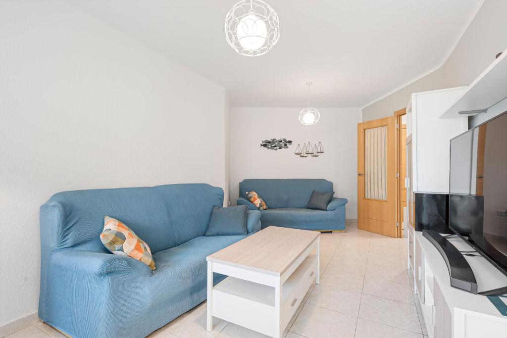 Televízia a/alebo spoločenská miestnosť v ubytovaní Apartamento Sol Playa Torrox A55