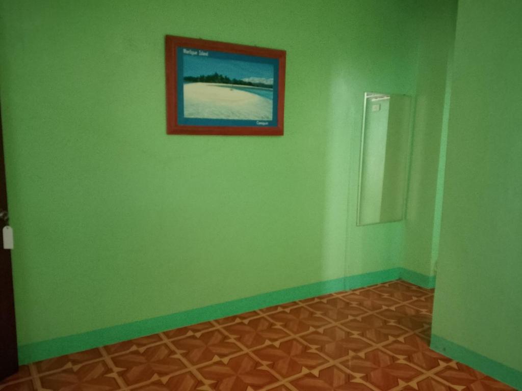 Fotografie z fotogalerie ubytování July's Haven Seaside Pension Camiguin v Mambajau