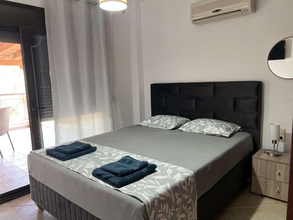 Postel nebo postele na pokoji v ubytování Villa-Alpha