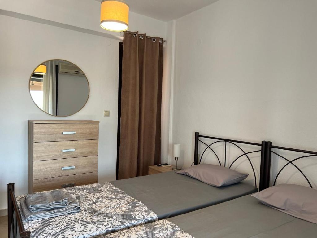 Postel nebo postele na pokoji v ubytování Villa-Alpha
