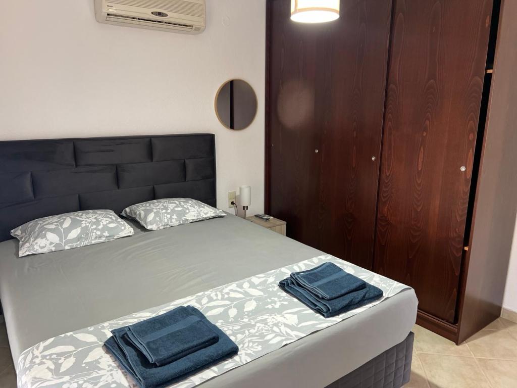 Postel nebo postele na pokoji v ubytování Villa-Alpha